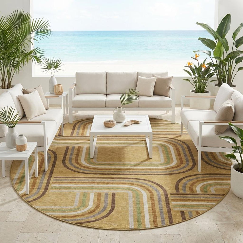 Round area rug in gold and ivory with geometric arc stripes and olive green accents