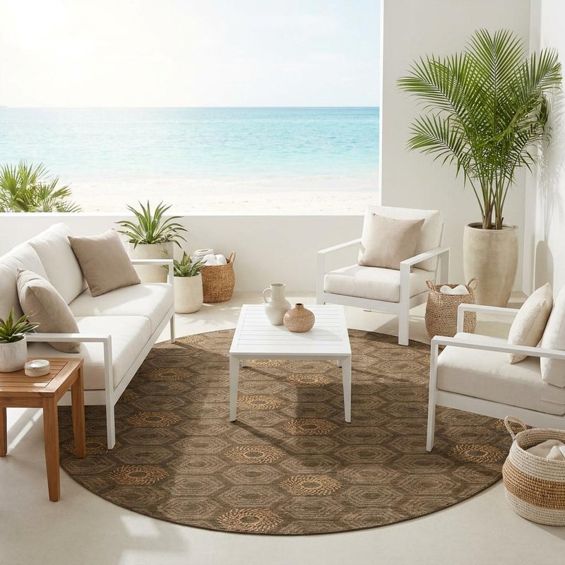 Round rug in gray-brown with tan geometric medallions under outdoor seating