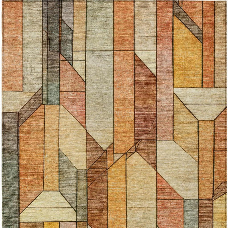 Geometric area rug close-up with orange, copper, and cream brick blocks