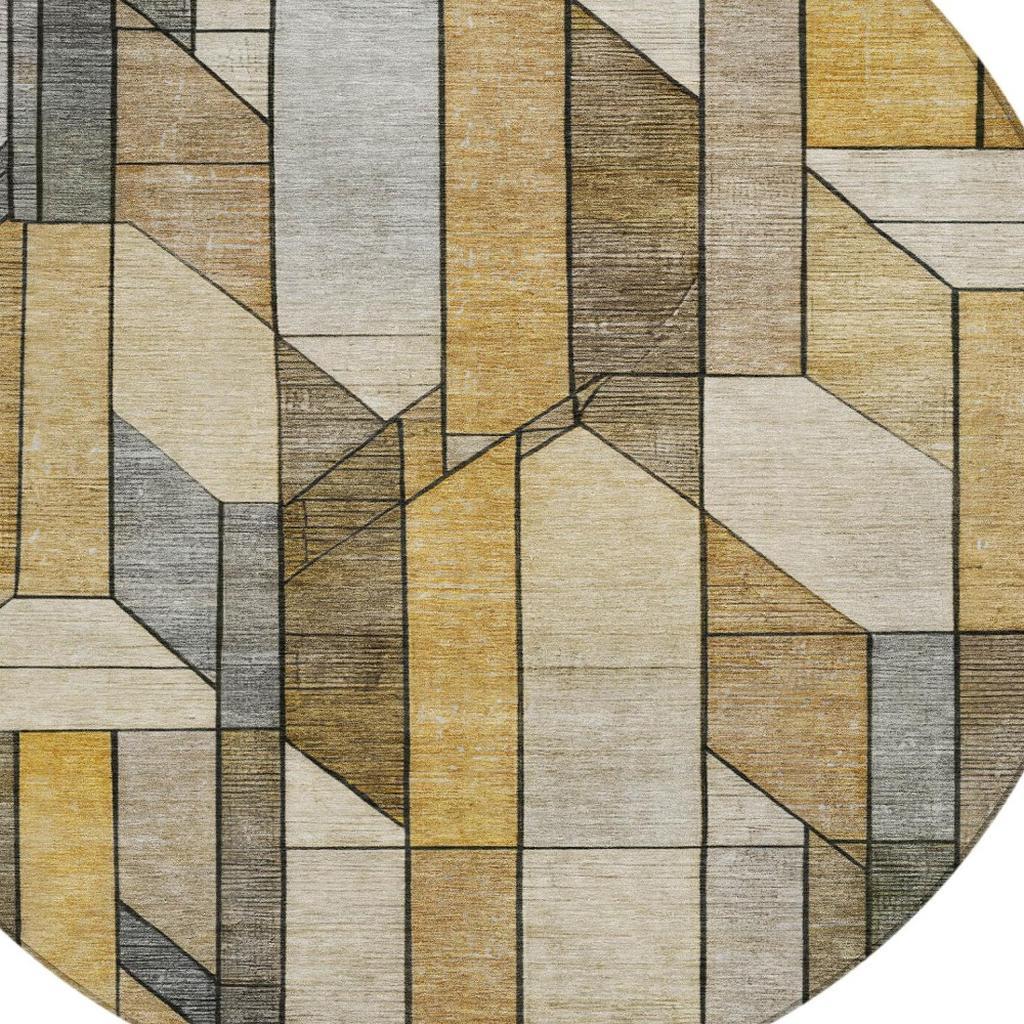 Round rug with abstract geometric pattern in beige, tan, and gray with dark outlines