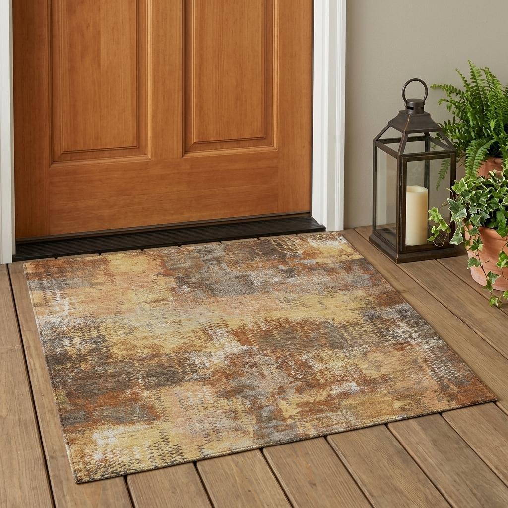 Abstract area rug with copper-orange, beige and gray mottled design on indoor floor