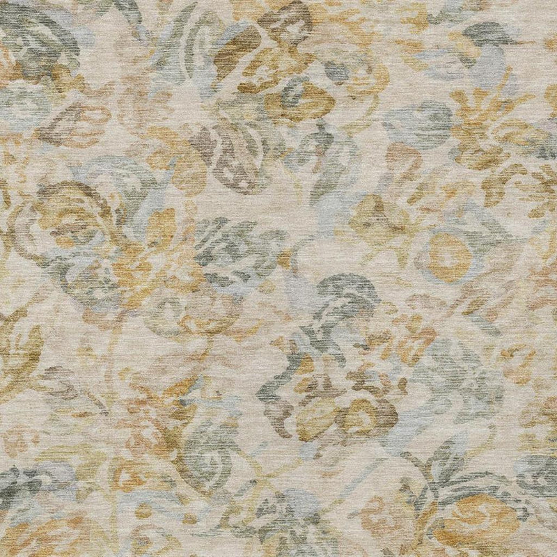 Close-up floral area rug pattern in wheat, gold, and muted blue on light base