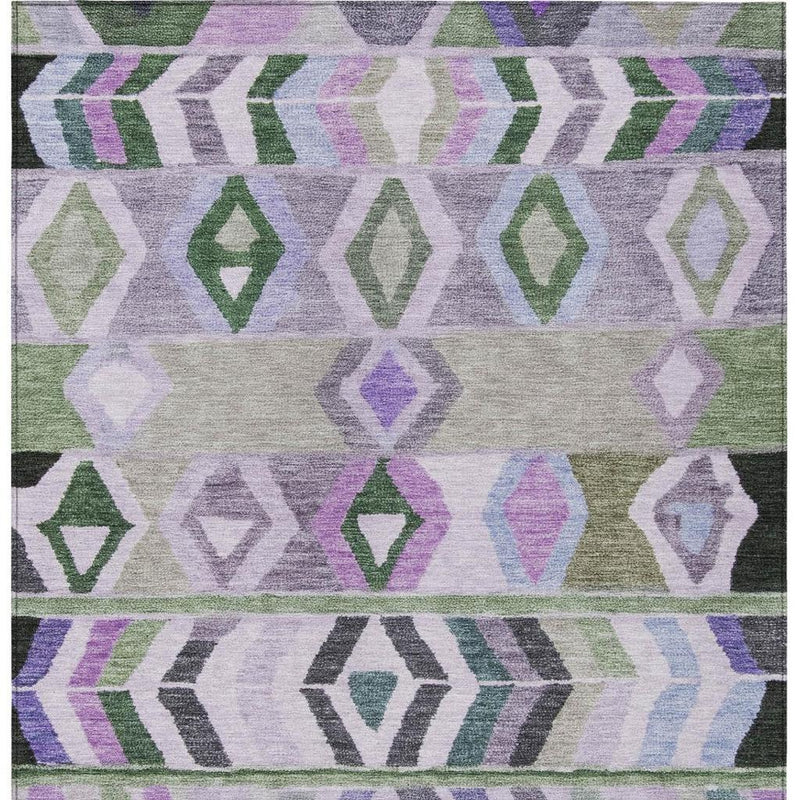 Tribal area rug with lavender, green, and gray repeating diamond and arrow motifs