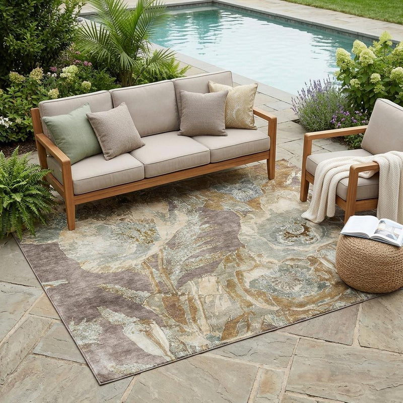 Brown and beige floral area rug with distressed botanical print on patio flooring