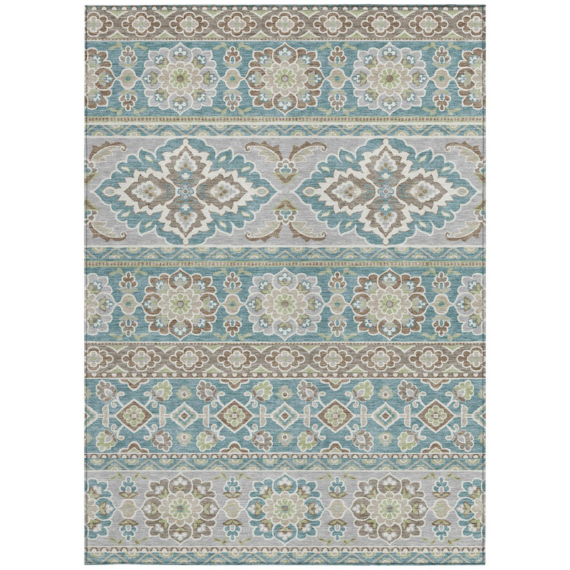 Full view of teal, green, and beige tribal patterned indoor outdoor area rug