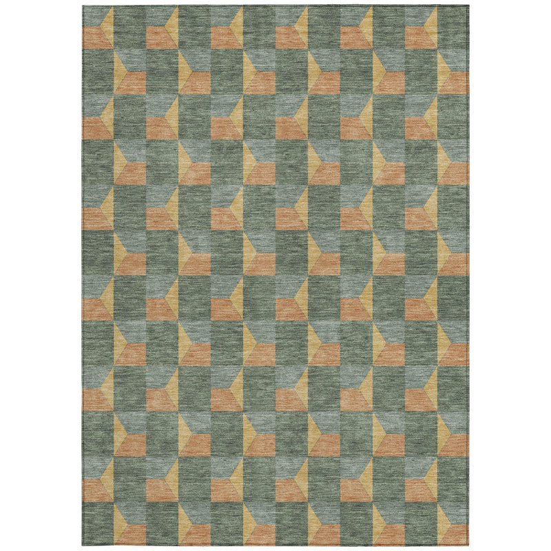 Full view of green-gray geometric area rug with repeating tan-orange cube and diamond shapes