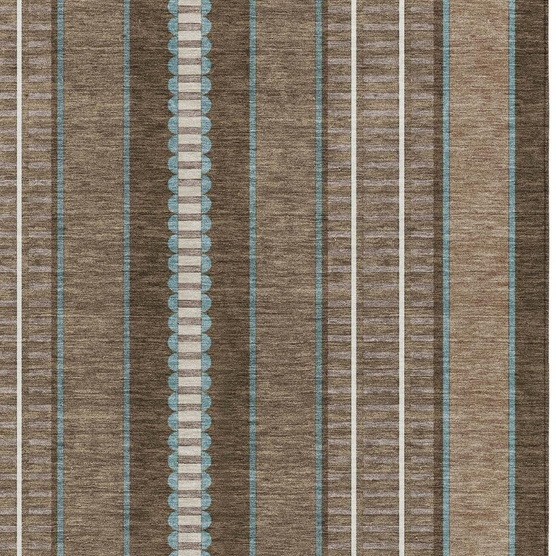 Striped area rug close-up with brown base and teal, white, and cream lines