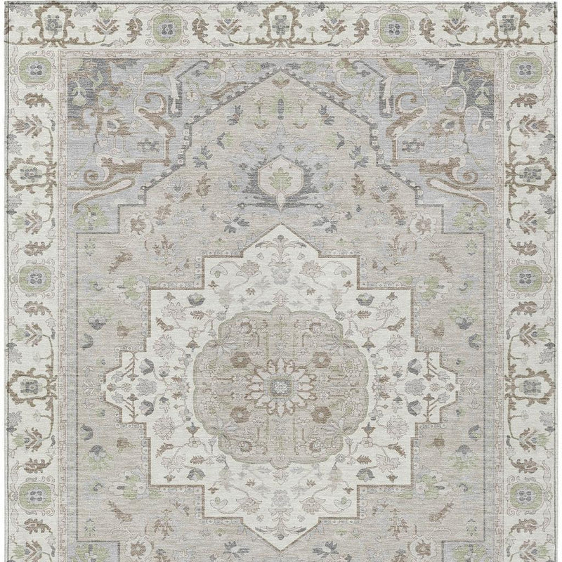 Ivory oriental rug with central medallion and corner spandrels, muted green and blue