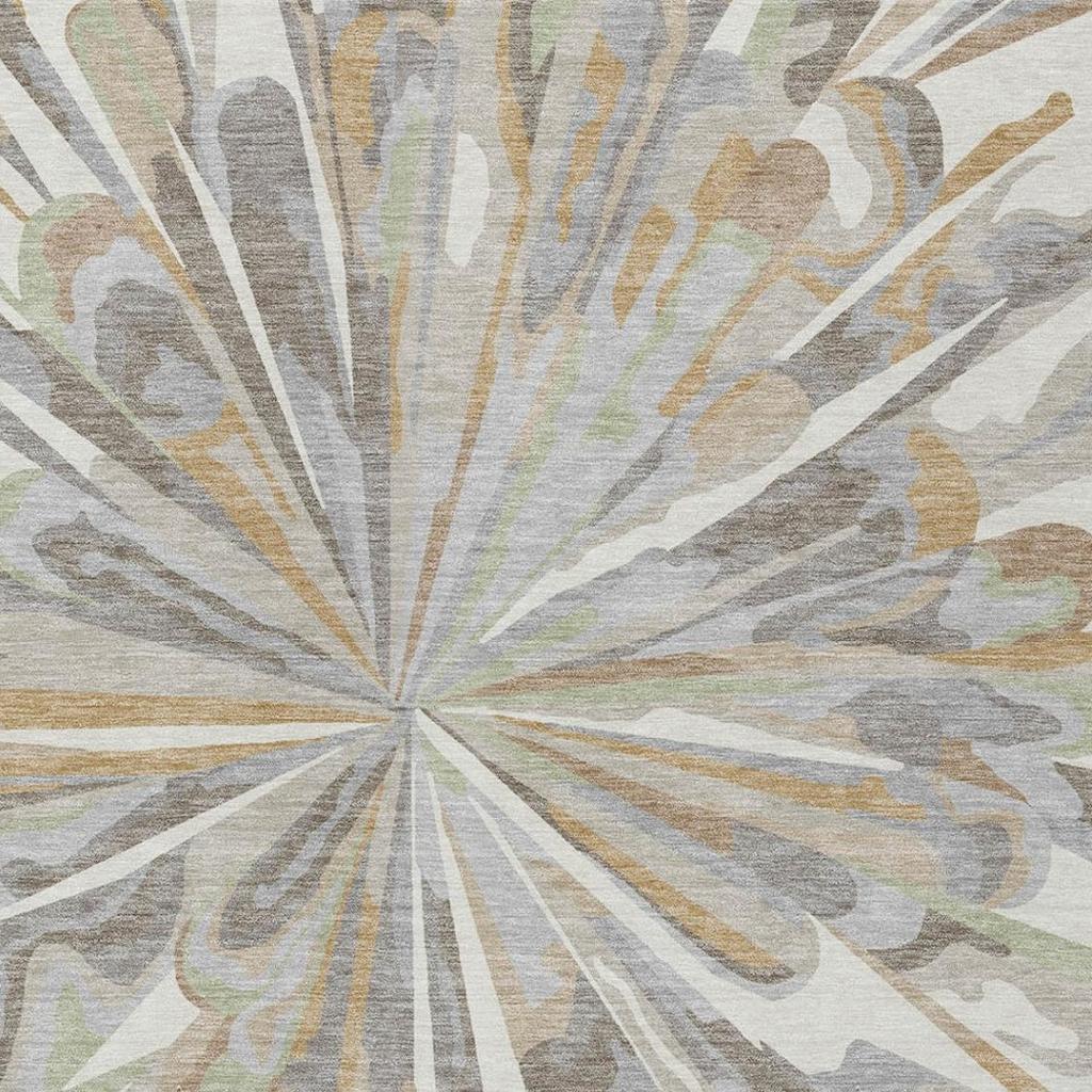 Close-up of ivory and silver abstract rug with sunburst lines and soft leaf-like shapes
