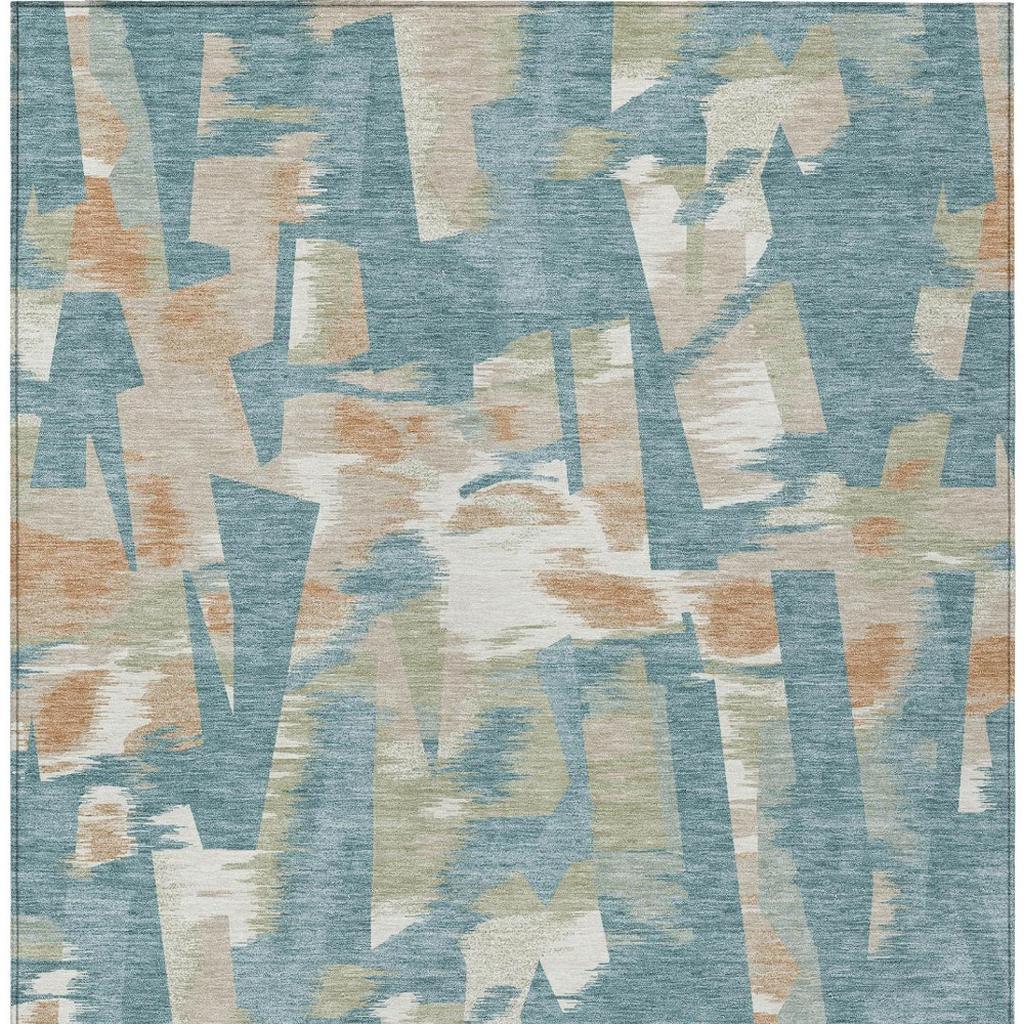 Teal blue abstract area rug with beige, cream, and white layered block design