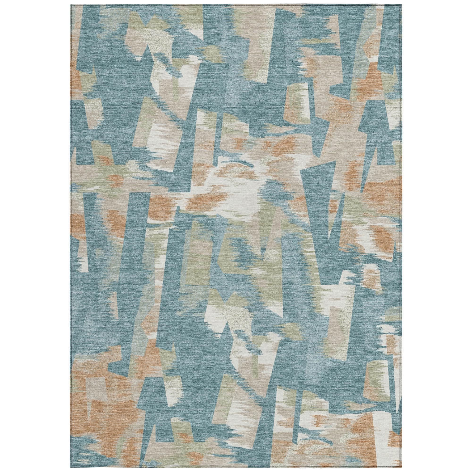 Rectangular abstract area rug in teal blue, beige, and cream with geometric blocks