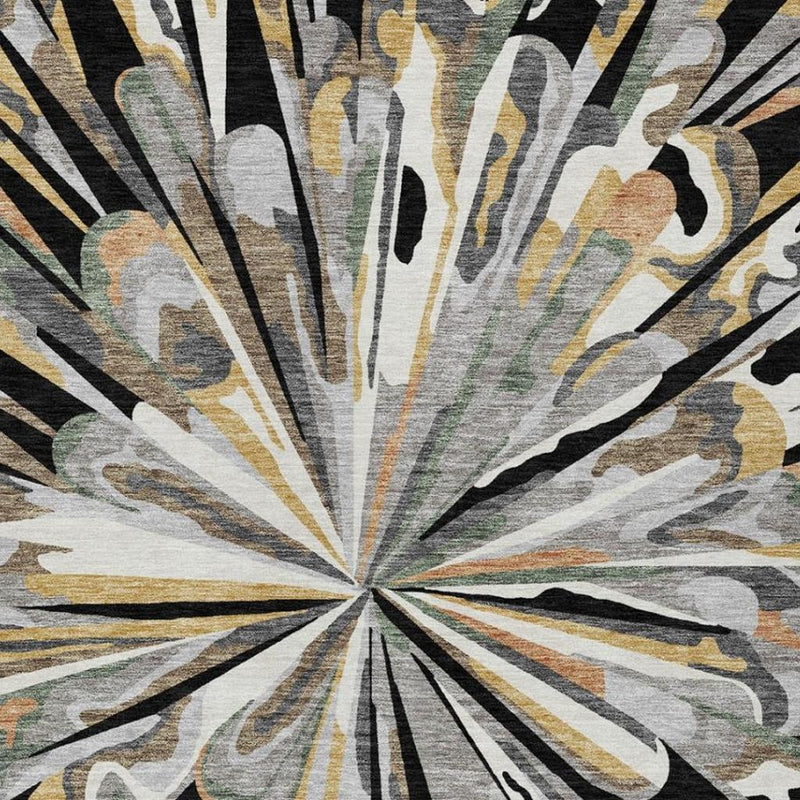 Abstract starburst area rug with black, gray, cream, and gold radial brush strokes