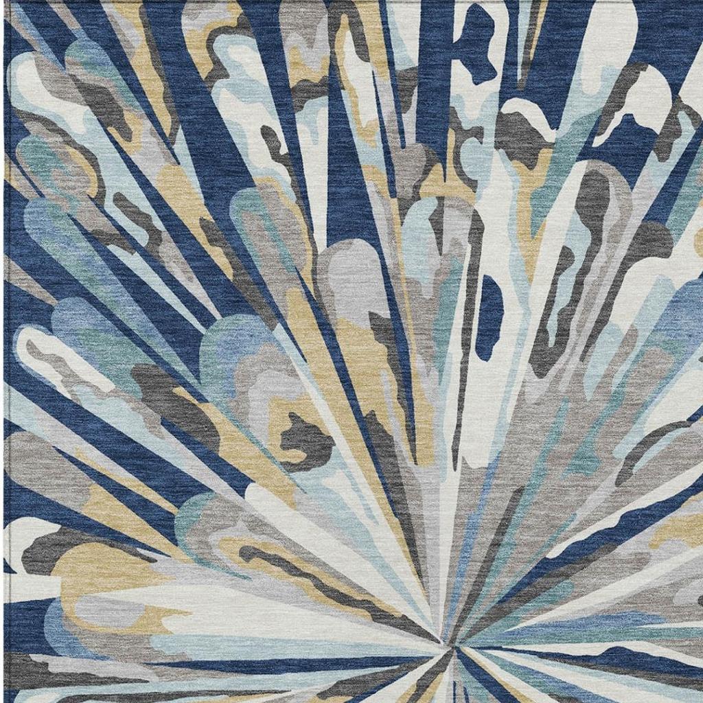 Navy blue abstract area rug featuring radial streaks around a central medallion