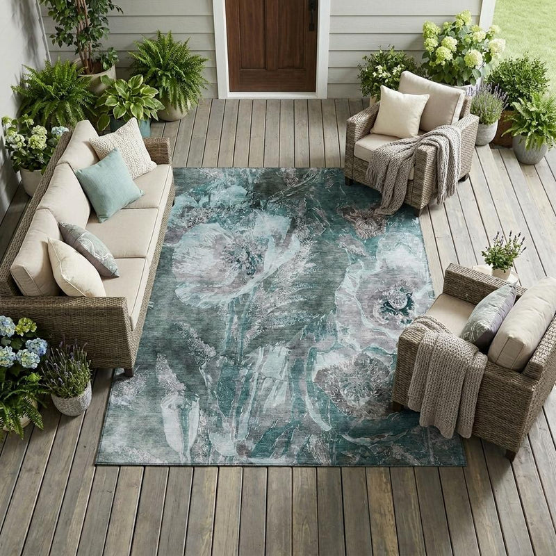 Teal blue and graphite floral abstract area rug with distressed light details
