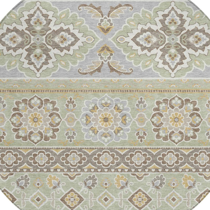 Round green and ivory floral tribal area rug with bordered stripe bands and central blooms