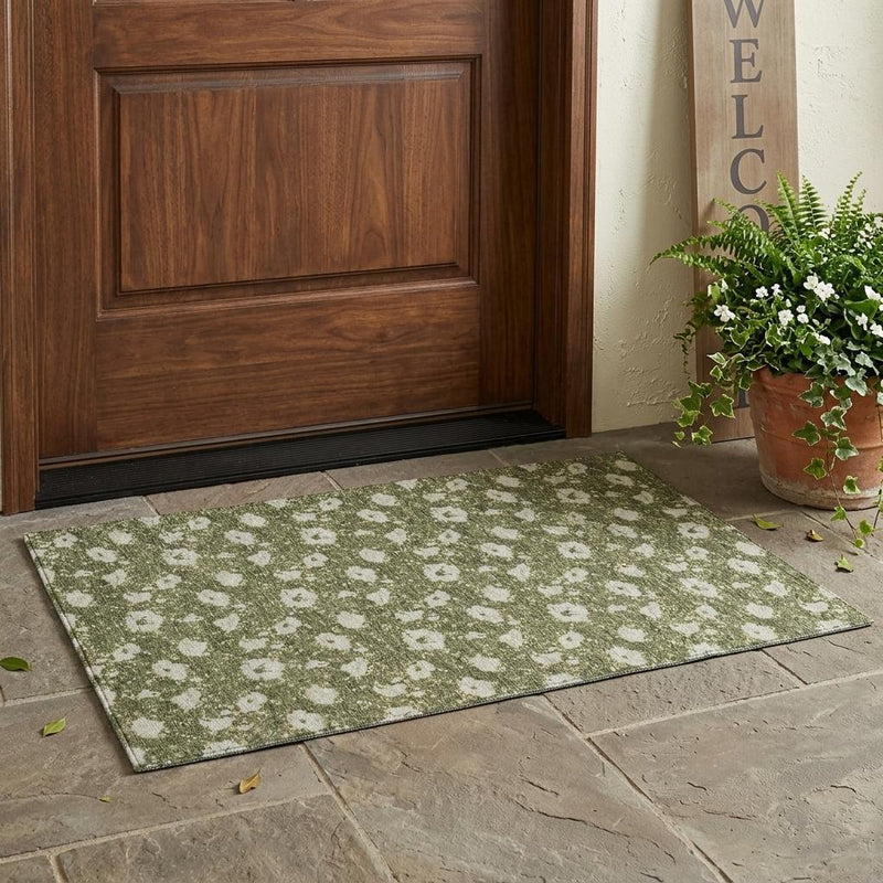 Indoor outdoor area rug with olive-green field and light floral pattern