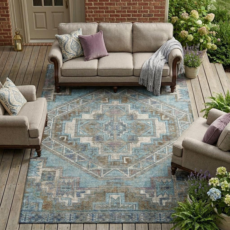 Southwestern area rug with teal blue medallion and gray geometric pattern, rectangular rug