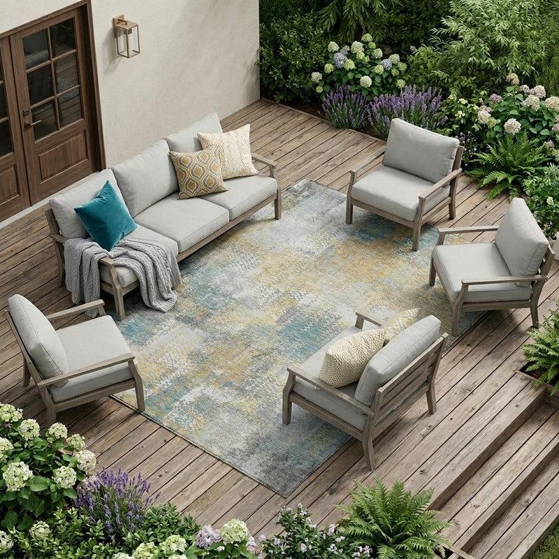 10x14 abstract washable area rug with silver, gray, blue, and yellow patchwork pattern
