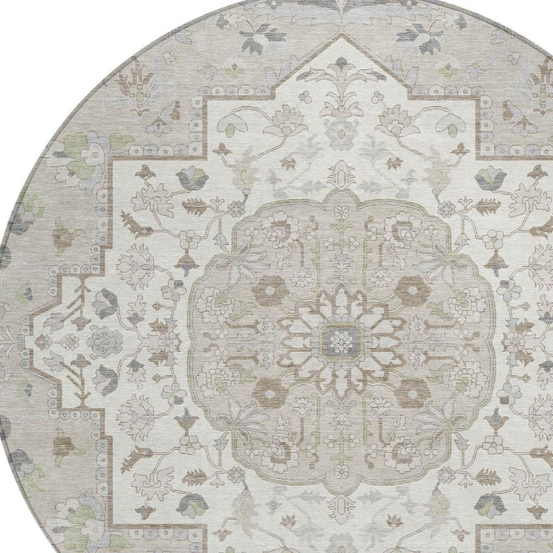 Ivory round oriental area rug with central floral medallion and multicolor motifs