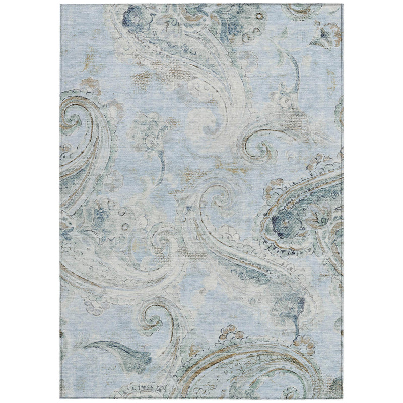 Light blue washable area rug with cream and blue distressed paisley pattern