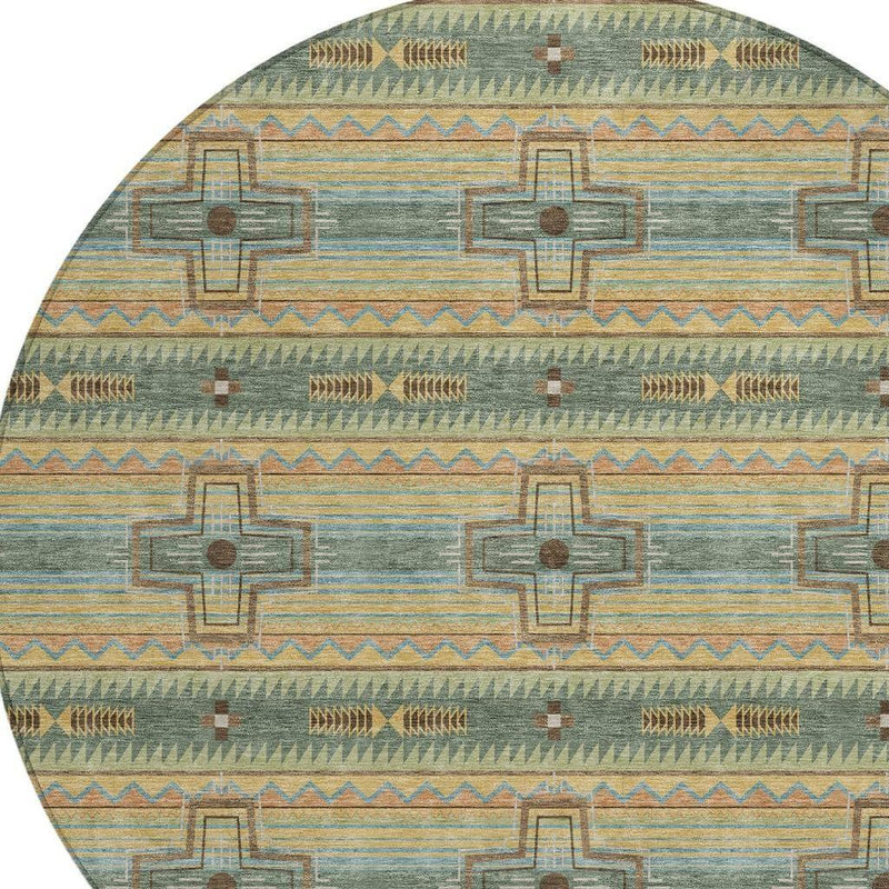 Round area rug close-up with green, beige, and teal tribal stripe motifs