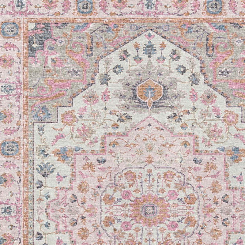 Pink and gray oriental area rug top view with central medallion and decorative corner details.
