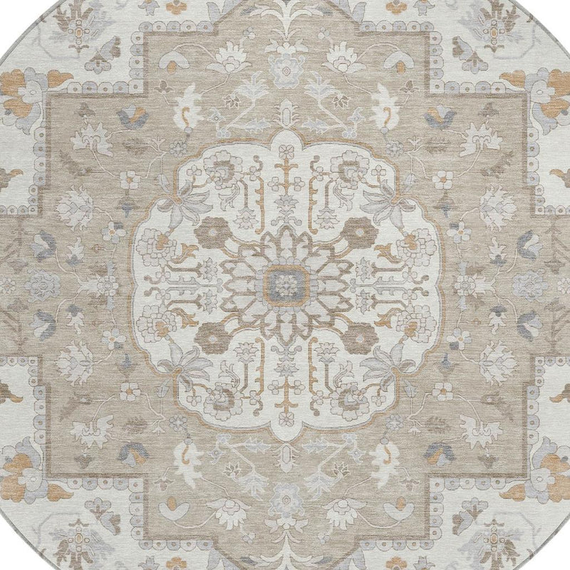 Center medallion detail on beige round oriental rug with floral and scroll accents