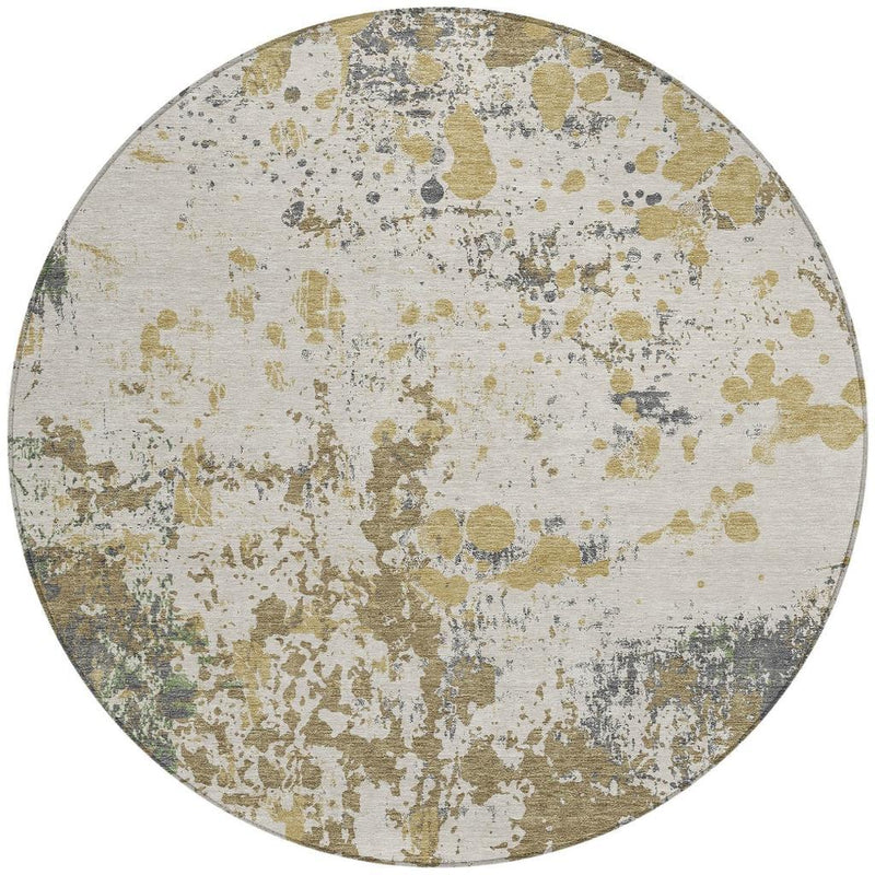 Round area rug with abstract distressed design in ivory, tan, olive, and blue-gray marks