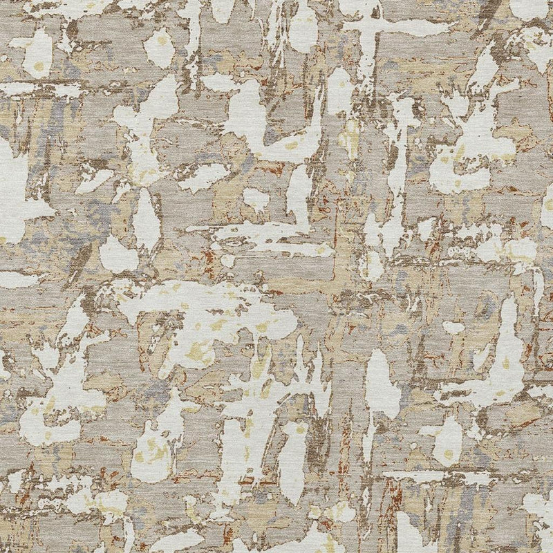 Beige and gray abstract wash-effect area rug with distressed blotch pattern
