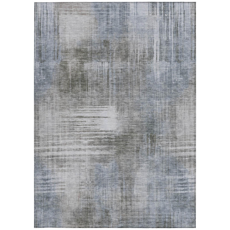 Full view abstract area rug with faded gray and blue-gray patchwork pattern