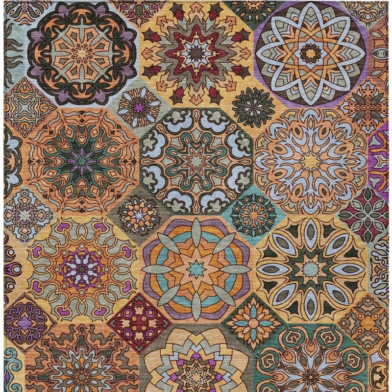 Geometric patchwork area rug close-up featuring star and medallion shapes in warm tones