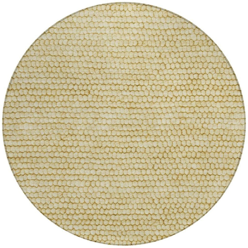 Round textured area rug in gold-and-wheat tone with dense pebble weave surface