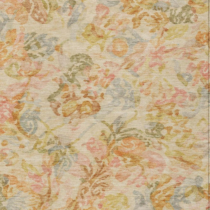Pastel floral area rug with multicolor distressed motifs on a light base