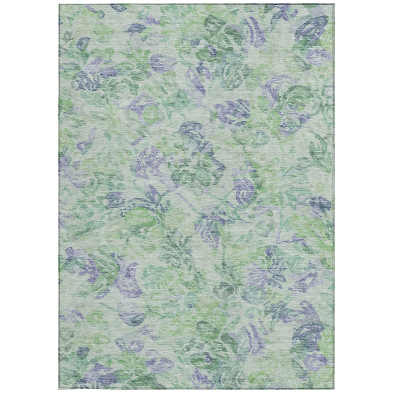 Floral area rug with light green and silvery lavender botanical pattern, bordered edges