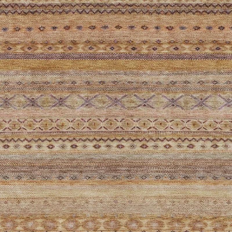 Top border view of orange and copper striped area rug with diamond and dot bands