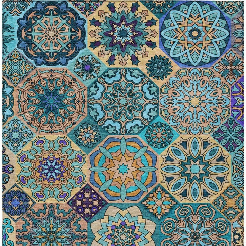 Close-up patchwork area rug with multicolor ornate rosette and star designs