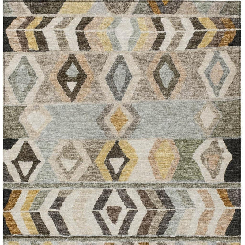 Tribal area rug with layered diamond and chevron patterns in gray, beige, and mustard