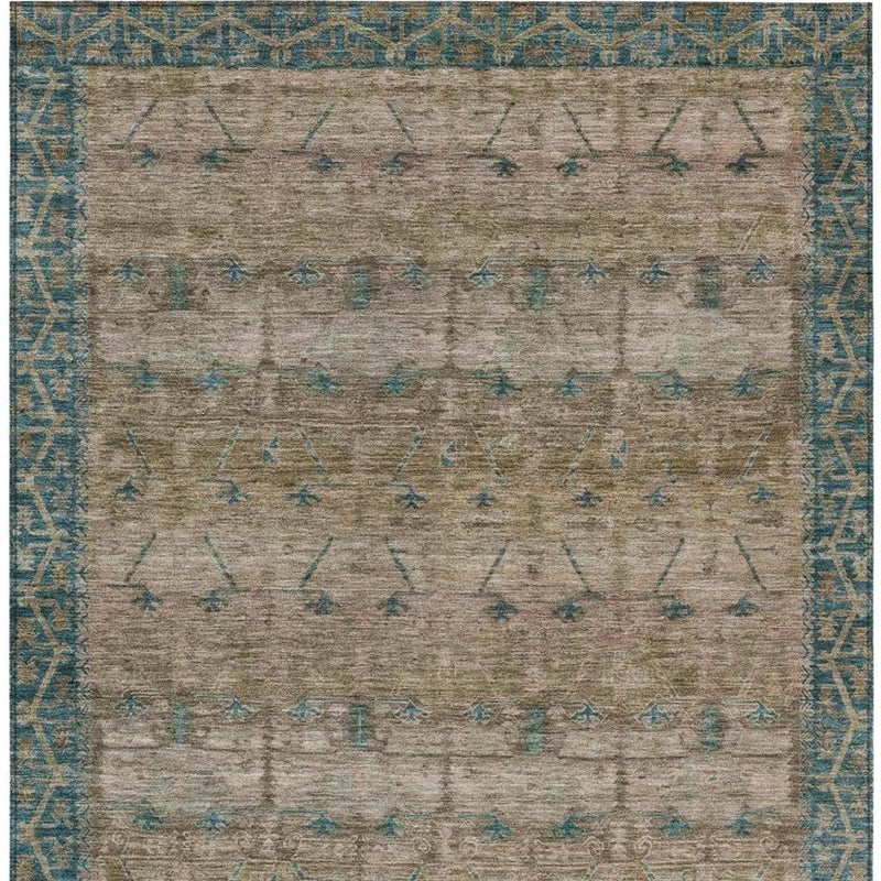 Taupe rectangular area rug with teal tribal design and decorative border pattern