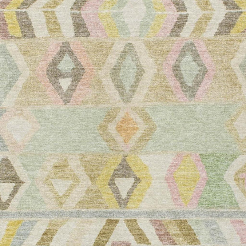 Close-up of multicolor tribal pattern on light cream area rug