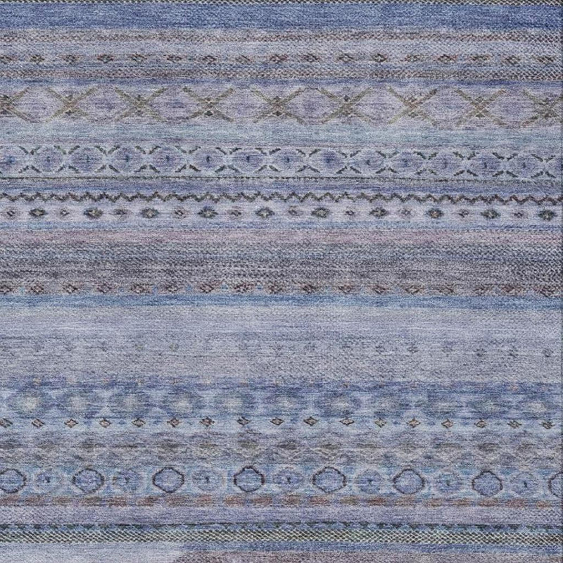 Textured blue area rug with lilac horizontal stripes and geometric details