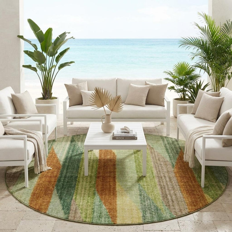 Round striped area rug with green, brown, and cream vertical bands on floor