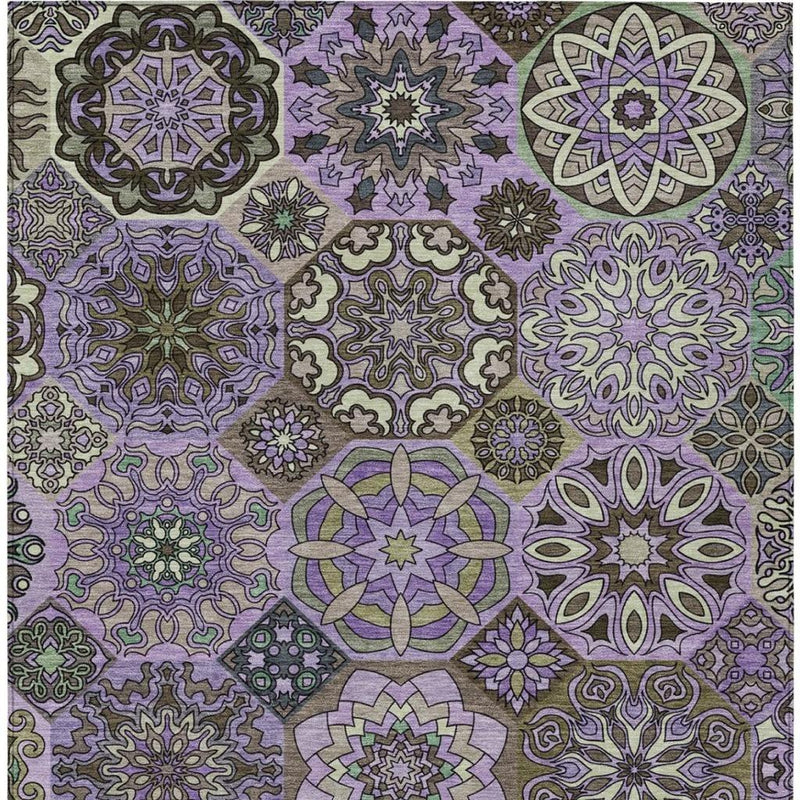 Patchwork area rug featuring purple geometric floral medallions and scrollwork
