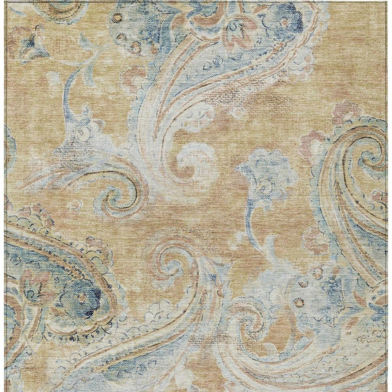 Rectangular rug close view with distressed beige and light blue ornamental swirls