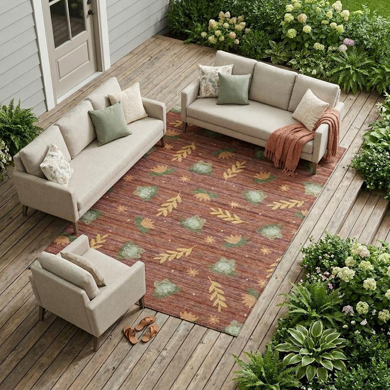 Botanical-pattern red and merlot area rug laid on wooden deck with leaf motifs