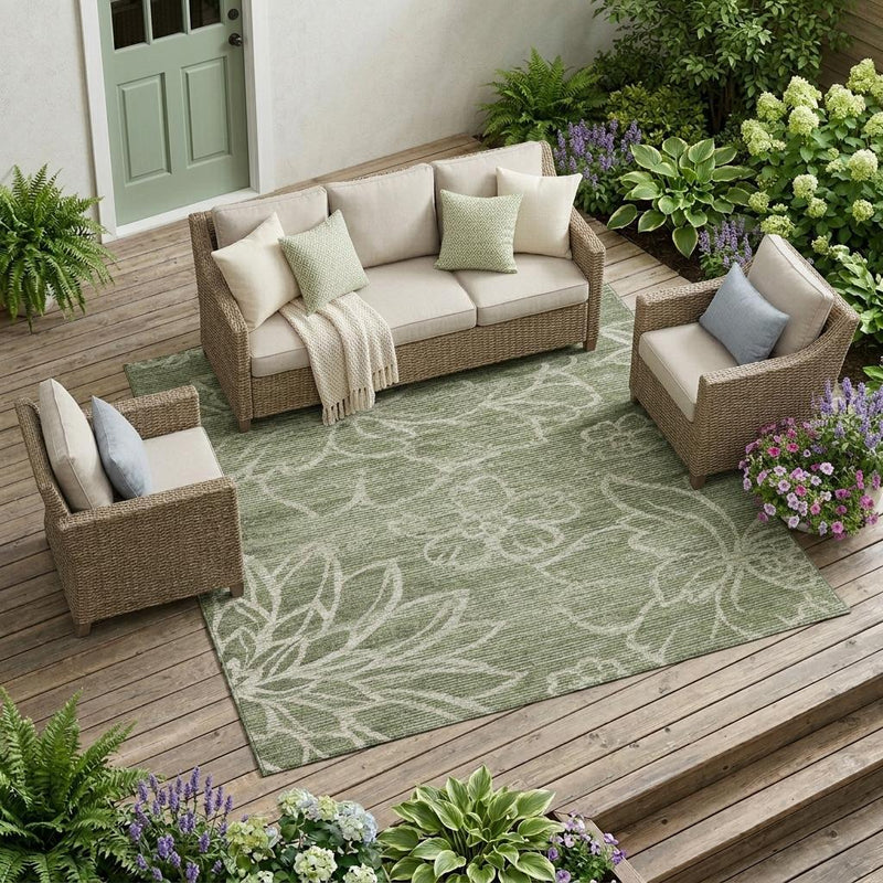 Olive green rectangular outdoor area rug with cream botanical floral pattern