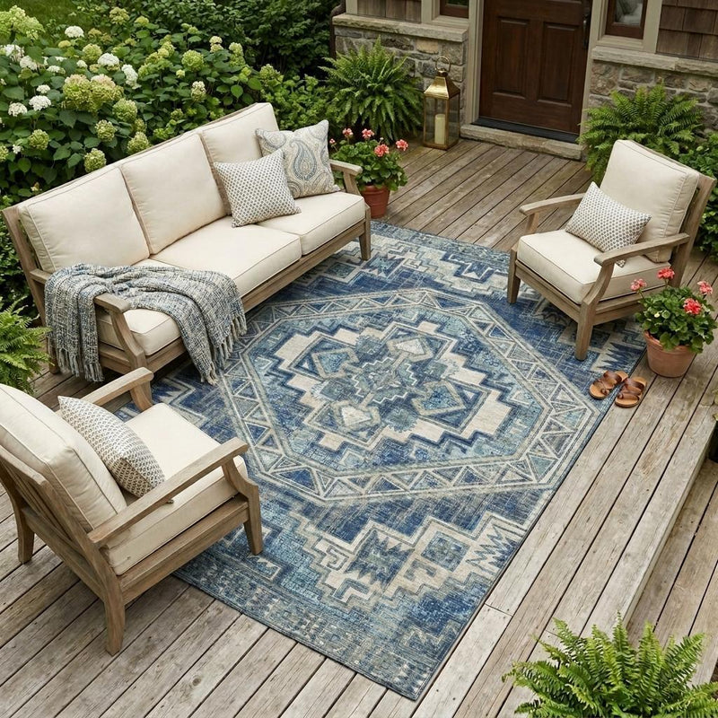 Blue and navy southwestern area rug on wooden patio with geometric diamond motif