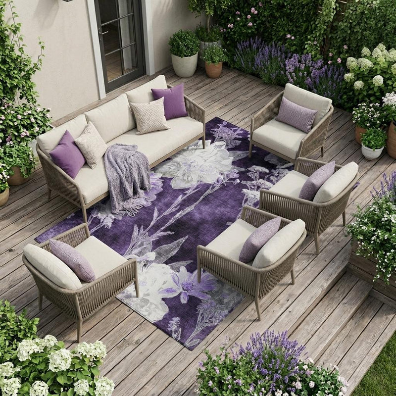 Purple and white floral indoor outdoor area rug with leafy stems and bordered look
