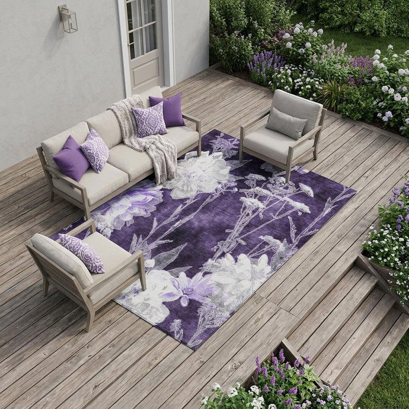 Outdoor area rug in lavender and purple with white floral print