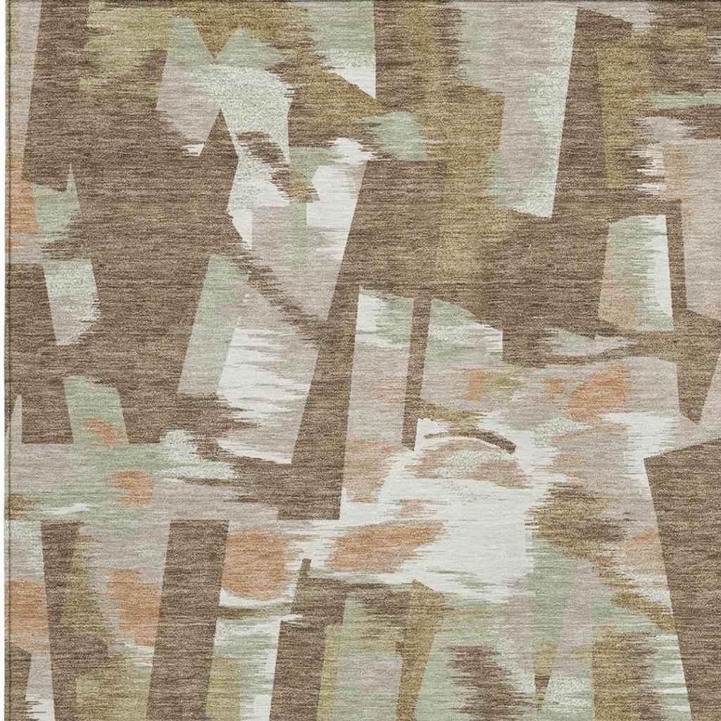 Abstract area rug texture view with beige, brown, white, and light orange blocks