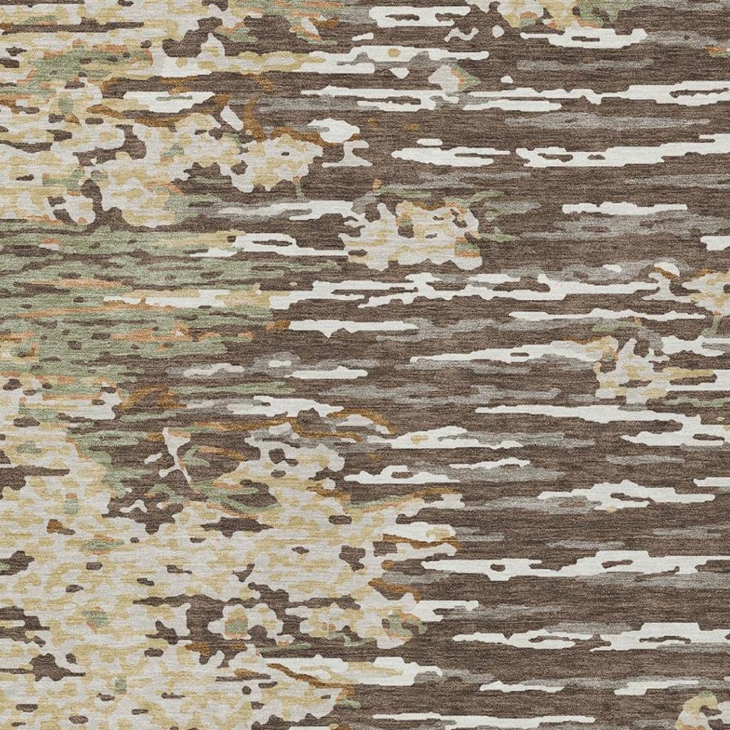 Abstract wash area rug close-up with cream, brown, gray, and olive scattered blocks and streaks.
